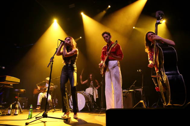 Kitty Durham, Daisy Durham, and Lewis Durham (center, from left), from the band Kitty, Daisy & Lewis, at a concert at Huxleys Neue Welt in Berlin on October 26, 2026. Kitty, Daisy & Lewis Concert in Berlin
