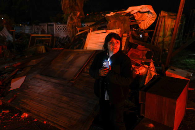 Tornado damages dozens of homes in central Chile REQUINOA, CHILE - OCTOBER 26: A woman waits near the buildings and infrastructure sustain damage after a tornado strikes the commune of Requinoa in Chile s O Higgins region on October 26, 2026. The weather event is preliminarily classified as an EF2 tornado, associated with wind speeds of 179 to 218 kilometers per hour. Approximately 70 properties are affected, one person sustains minor injuries, and around 3,000 customers are left without electricity. Lucas Aguayo Araos Anadolu Requinoa Chile. Editorial use only. Please get in touch for any other usage.  Copyright: x2026xAnadoluxLucasxAguayoxAraosx