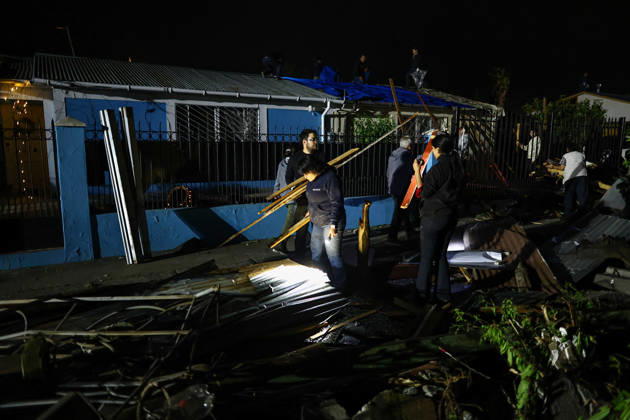 Tornado damages dozens of homes in central Chile REQUINOA, CHILE - OCTOBER 26: Residents help with cleanup efforts in the affected area as buildings and infrastructure sustain damage after a tornado strikes the commune of Requinoa in Chile s O Higgins region on October 26, 2026. The weather event is preliminarily classified as an EF2 tornado, associated with wind speeds of 179 to 218 kilometers per hour. Approximately 70 properties are affected, one person sustains minor injuries, and around 3,000 customers are left without electricity. Lucas Aguayo Araos Anadolu Requinoa Chile. Editorial use only. Please get in touch for any other usage.  Copyright: x2026xAnadoluxLucasxAguayoxAraosx