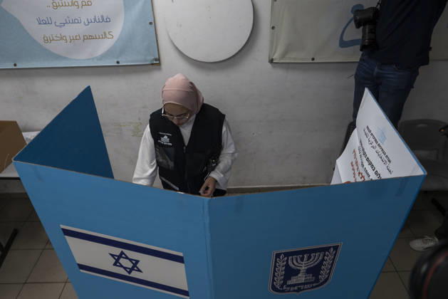 Israelis head to the polls in parliamentary elections UMMUMM AL-FAHM, ISRAEL - OCTOBER 27: A woman sets up ballot boxes and voting booths at Al-Aqwas School ahead of Israel s parliamentary elections in the northern city of Umm al-Fahm, Israel, on October 27, 2026. Voting began Tuesday in Israel’s parliamentary elections, with more than 7.3 million people eligible to cast ballots to elect the 120-member Knesset. Mostafa Alkharouf Anadolu Ummumm al-Fahm Israel. Editorial use only. Please get in touch for any other usage.  Copyright: x2026xAnadoluxMostafaxAlkharoufx