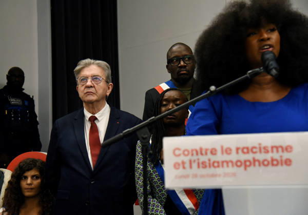 Jean-Luc Melenchon At Rally Against Racism In Tribute To Pengo Bossio Wangi - La Courneuve leftist party La France Insoumise (LFI) candidate in France s 2027 presidential election Jean-Luc Melenchon, anti-racist activist Assa Traore during a rally against racism and islamophobia to Pengo Bossio Wangi, victim of a racist attack in Trappes, in the Yvelines departement near Paris, by bursts whose alleged perpetrator, Kevin T. is suspected of having acted by racism, La Courneuve, France on October 26, 2026. Photo by Alain Apaydin ABACAPRESS.COM La Courneuve France  Copyright: xApaydinxAlain ABACAx