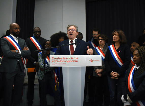 Jean-Luc Melenchon At Rally Against Racism In Tribute To Pengo Bossio Wangi - La Courneuve La Courneuve 2nd Deputy mayor Mohamed Awad, leftist party La France Insoumise (LFI) candidate in France s 2027 presidential election Jean-Luc Melenchon, anti-racist activist Assa Traore, La Courneuve s mayor Aly Diouara during a rally against racism and islamophobia to Pengo Bossio Wangi, victim of a racist attack in Trappes, in the Yvelines departement near Paris, by bursts whose alleged perpetrator, Kevin T. is suspected of having acted by racism, La Courneuve, France on October 26, 2026. Photo by Alain Apaydin ABACAPRESS.COM La Courneuve France  Copyright: xApaydinxAlain ABACAx