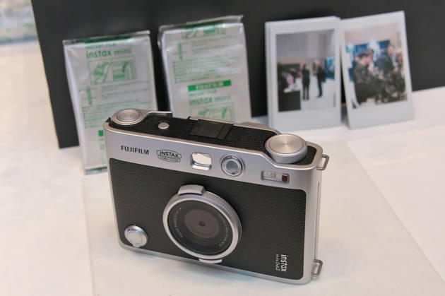Fujifilm new instant camera instax mini Evo 2 displayed during an unveiling event for new instant camera in Tokyo, Japan on Tuesday, October 27, 2026. Fujifilm has decided to invest 3 billion JPY to reinforce production facilities for instax films.  TKP2026102714 KEIZOxMORI