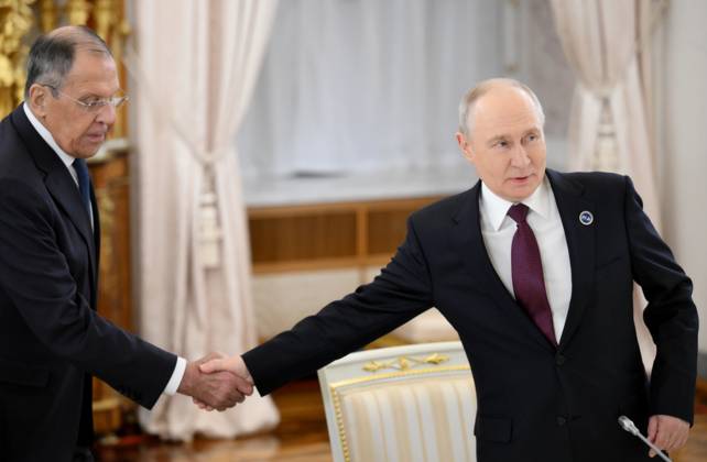 President Vladimir Putin meets with Emir of Qatar Tamim bin Hamad Al Thani 9274885 27.10.2026 Russian President Vladimir Putin and Russian Foreign Minister Sergei Lavrov, left, before a meeting with Emir of Qatar Tamim bin Hamad Al Thani on the sidelines of the 8th summit of the Gas Exporting Countries Forum in Moscow. Grigory Sysoev Sputnik Crediting the source in the following order photographer s name 8th GECF summit host photo agency is mandatory when using the photo Moscow Russia  Copyright: xGrigoryxSysoevx