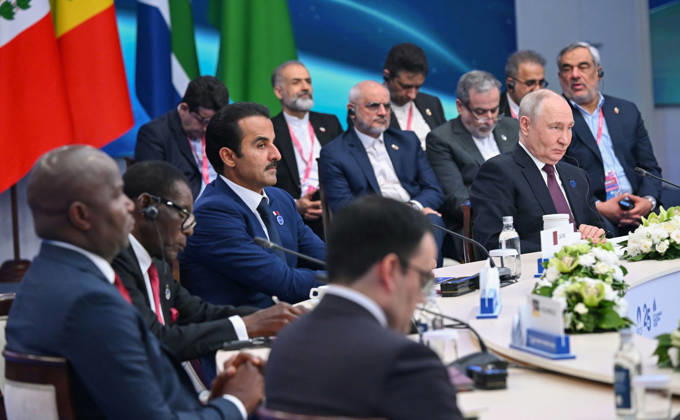 Russian President Vladimir Putin (R) and leaders attend the 8th Gas Exporting Countries Forum (GECF) summit at the World Trade Center in Moscow , Russia, Tuesday, October. 27, 2026. The summit discussed the energy crisis and the closure of the Strait of Hormuz. On the sidelines of the event, Russian President Vladimir Putin met with Iranian President Masoud Pezeshkian and Qatari Emir Sheikh Tamim bin Hamad Al Thani to discuss the same crisis, tensions with the United States, and the implications of escalating military activity in the Gulf region.  RUS2026102717 KremlinxPressxOffice