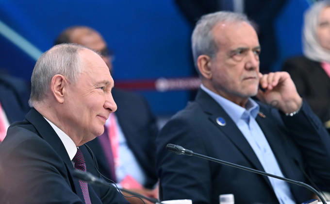 Russian President Vladimir Putin (L) and Iranian President Masoud Pezeshkian (R) attend the 8th Gas Exporting Countries Forum (GECF) summit at the World Trade Center in Moscow, Russia, Tuesday, October. 27, 2026. The summit discussed the energy crisis and the closure of the Strait of Hormuz. On the sidelines of the event, Russian President Vladimir Putin met with Iranian President Masoud Pezeshkian and Qatari Emir Sheikh Tamim bin Hamad Al Thani to discuss the same crisis, tensions with the United States, and the implications of escalating military activity in the Gulf region.  RUS2026102718 KremlinxPressxOffice