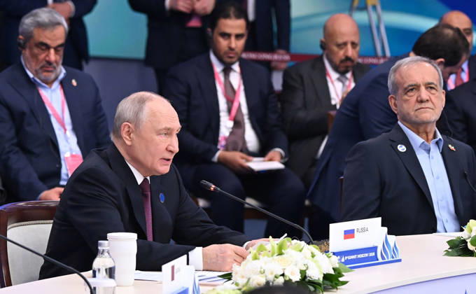 Russian President Vladimir Putin (L) and Iranian President Masoud Pezeshkian (R) attend the 8th Gas Exporting Countries Forum (GECF) summit at the World Trade Center in Moscow, Russia, Tuesday, October. 27, 2026. The summit discussed the energy crisis and the closure of the Strait of Hormuz. On the sidelines of the event, Russian President Vladimir Putin met with Iranian President Masoud Pezeshkian and Qatari Emir Sheikh Tamim bin Hamad Al Thani to discuss the same crisis, tensions with the United States, and the implications of escalating military activity in the Gulf region.  RUS2026102720 KremlinxPressxOffice