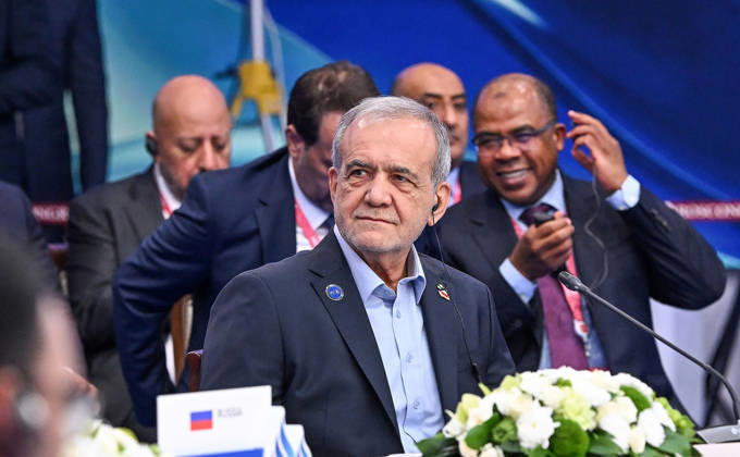 Iranian President Masoud Pezeshkian attends the 8th Gas Exporting Countries Forum (GECF) summit at the World Trade Center in Moscow, Russia, Tuesday, October. 27, 2026. The summit discussed the energy crisis and the closure of the Strait of Hormuz. On the sidelines of the event, Russian President Vladimir Putin met with Iranian President Masoud Pezeshkian and Qatari Emir Sheikh Tamim bin Hamad Al Thani to discuss the same crisis, tensions with the United States, and the implications of escalating military activity in the Gulf region.  RUS2026102722 KremlinxPressxOffice