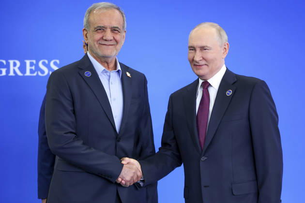 October 27, 2026, Moscow, Russian Federation: Russian President Vladimir Putin shakes hands with Iranian President Masoud Pezeshkian, left, during the official welcoming ceremony for the heads of delegations participating in the 8th summit of the Gas Exporting Countries Forum, October 27, 2026 in Moscow, Russia. Moscow Russian Federation - ZUMAp138 20261027_zaa_p138_008 Copyright: xKirillxKazachkov RoscongressxFoux