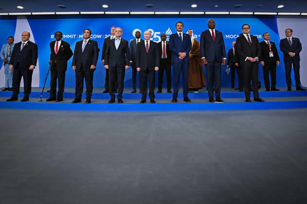 October 27, 2026, Moscow, Russia: Russian President Vladimir Putin and Iranian President Masoud Pezeshkian stand alongside other heads of delegations for an official group photograph at the GECF summit in Moscow, Russia, on October 27, 2026. The event brought together leaders from the forum s member countries and invited delegations, including Iran, Russia, Qatar, Libya and Mozambique. Moscow Russia - ZUMAi98_ 20261027_zih_i98_046 Copyright: xIranianxPresidencyx