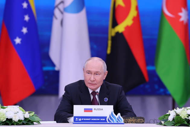 October 27, 2026, Moscow, Russia: Russian President Vladimir Putin speaks into a microphone behind a Russia nameplate at the eighth Gas Exporting Countries Forum summit in Moscow, Russia, on October 27, 2026. Putin chaired the eighth summit of the Gas Exporting Countries Forum (GECF), which brought together heads of delegations for talks on natural gas markets and global energy security. Moscow Russia - ZUMAi98_ 20261027_zih_i98_014 Copyright: xIranianxPresidencyx
