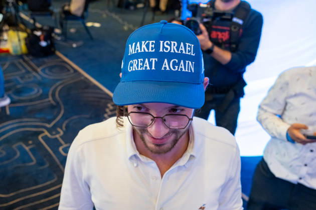 Israel, Jerusalem, October 27–28, 2026: Scenes from the election rally of the Likud Party led by incumbent Prime Minister Benjamin Netanyahu. There was a long wait for Bibi to appear; he didn’t take the stage until around 3:15 a.m. Baseball caps bearing the slogan Make Israel Great Again were handed out at the event.