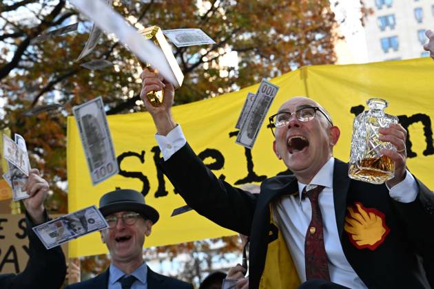 Climate activists hold demonstration in London LONDON, UNITED KINGDOM - OCTOBER 28: Climate activists stage a protest near the headquarters of energy company Shell, following a call by environmental group Fossil Free London, in London, United Kingdom, on October 28, 2026. During the demonstration, activists dressed as executives take part in a theatrical performance, throwing fake banknotes into the air and displaying banners criticizing the company s profits and fossil fuel activities. Rasid Necati Aslim Anadolu London United Kingdom. Editorial use only. Please get in touch for any other usage.  Copyright: x2026xAnadoluxRasidxNecatixAslimx