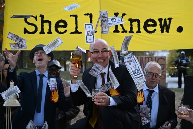 Climate activists hold demonstration in London LONDON, UNITED KINGDOM - OCTOBER 28: Climate activists stage a protest near the headquarters of energy company Shell, following a call by environmental group Fossil Free London, in London, United Kingdom, on October 28, 2026. During the demonstration, activists dressed as executives take part in a theatrical performance, throwing fake banknotes into the air and displaying banners criticizing the company s profits and fossil fuel activities. Rasid Necati Aslim Anadolu London United Kingdom. Editorial use only. Please get in touch for any other usage.  Copyright: x2026xAnadoluxRasidxNecatixAslimx