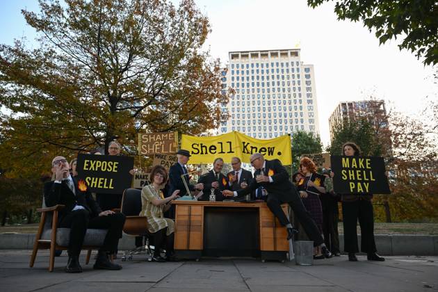 Climate activists hold demonstration in London LONDON, UNITED KINGDOM - OCTOBER 28: Climate activists stage a protest near the headquarters of energy company Shell, following a call by environmental group Fossil Free London, in London, United Kingdom, on October 28, 2026. During the demonstration, activists dressed as executives take part in a theatrical performance, throwing fake banknotes into the air and displaying banners criticizing the company s profits and fossil fuel activities. Rasid Necati Aslim Anadolu London United Kingdom. Editorial use only. Please get in touch for any other usage.  Copyright: x2026xAnadoluxRasidxNecatixAslimx