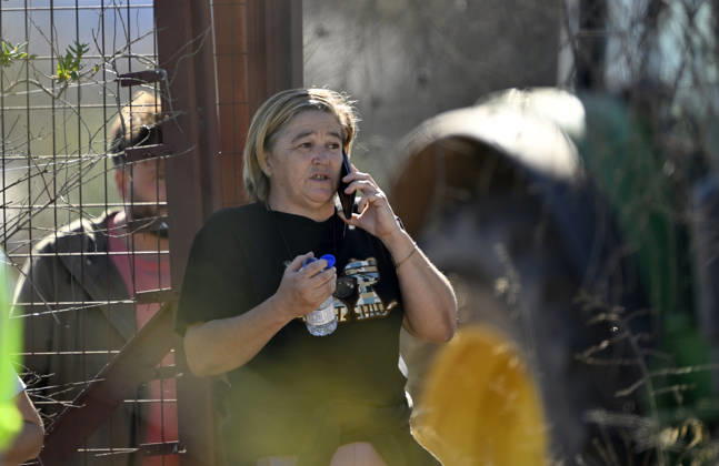 Death toll in Spain high-speed train collision climbs to 46 TOLEDO, SPAIN - OCTOBER 28: A woman speaks on her mobile phone near the scene of a collision involving two high-speed trains in Toledo province, Spain, on October 28, 2026. At least 46 people were killed and many others injured in the collision, according to Spanish media reports. Emergency crews continue rescue operations as authorities investigate the cause of the accident.Referans ekle Burak Akbulut Anadolu Toledo Spain. Editorial use only. Please get in touch for any other usage.  Copyright: x2026xAnadoluxBurakxAkbulutx
