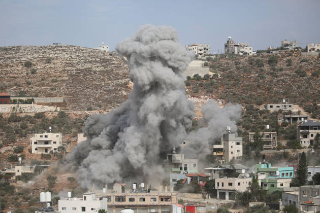Smoke Rises as Israeli Forces Demolish Family Homes in Beita Smoke rises from a residential area as Israeli forces demolish homes belonging to members of the Daoud family in the village of Beita, south of the West Bank city of Nablus, on October 28, 2026. Several members of the family were arrested earlier this year. Photo by Mohammed Nasser apaimages Nablus West Bank Palestinian Territory 281026_Nablus_MN_00(23) Copyright: xapaimagesxMohammedxNasserx xapaimagesx