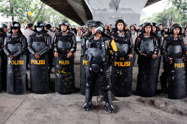 October 28, 2026, Bandung, West Java, Indonesia: Police officers were on duty as they maintained order during a demonstration held to commemorate the 98th Youth Pledge Day in front of the West Java Regional Representative Council building in Bandung, West Java, Indonesia. During the demonstration, protesters called for forest and land fires to be declared a national disaster, demanded transparency in the budget allocation for the Free Nutritious Meals (MBG) program, and urged the government to address social welfare issues. Bandung Indonesia - ZUMAa305 20261028_zip_a305_014 Copyright: xArdixSeptianx