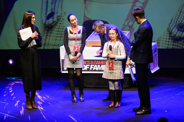October 28, 2026, Lucca, Lucca, Italy: The variant cover of the poster created by the young talent Louise Sto phant (winner of the Petit Fauve in AngouloÂªme) is unveiled on the theatre stage during the inauguration of the 60th edition of Lucca Comics & Games, Lucca, 28 10 2026 Lucca Italy  - ZUMAa289 20261028_zia_a289_107 Copyright: xStefanoxDallexLuchex xAgfx