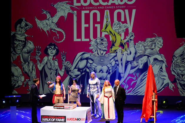 October 28, 2026, Lucca, Lucca, Italy: Claudio Castellini, author of the Lucca Comics & Games 2026 poster, on the occasion of the 60th anniversary of the event, enters the Lucca Comics & Games Walk Of Fame by leaving his fingerprints on the tile, autographing it to remain in the history of the event alongside his characters drawn over the years, Lucca, 28 10 2026 Lucca Italy - ZUMAa289 20261028_zia_a289_151 Copyright: xStefanoxDallexLuchex xAgfx