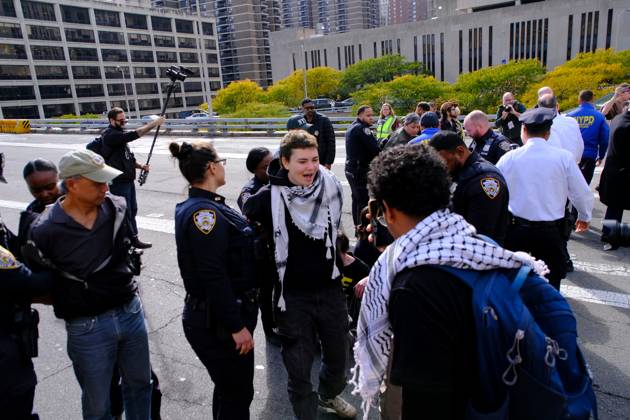 NEW YORK, NY- OCTOBER 28: 13 activists were arrested on the Brooklyn Bridge to demand I.C.E stop shooting New Yorkers on October 28, 2026 in New York City. Copyright: xKatiexGodowski MediaPunchx