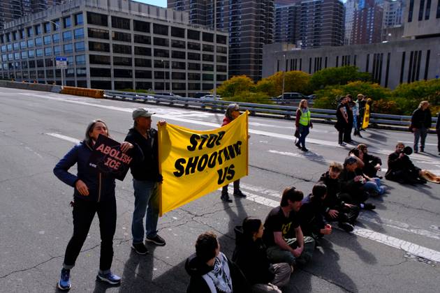 NEW YORK, NY- OCTOBER 28: 13 activists were arrested on the Brooklyn Bridge to demand I.C.E stop shooting New Yorkers on October 28, 2026 in New York City. Copyright: xKatiexGodowski MediaPunchx