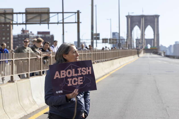 October 28, 2026, New York, New York, USA: Anti-ICE (U.S. Immigration and Customs Enforcement) demonstrators blockade the roadway on the Brooklyn Bridge holding signs that read ABOLISH ICE protesting the continued detainment of O. Belgal, who was shot by federal agents in the Bronx with his 5-yr-old son in the car. The demonstration stopped Brooklyn bound traffic and results in arrests by NYPD. Protesters call for ICE out of New York. New York USA - ZUMAr174 20261028_znp_r174_009 Copyright: xGinaxMxRandazzox