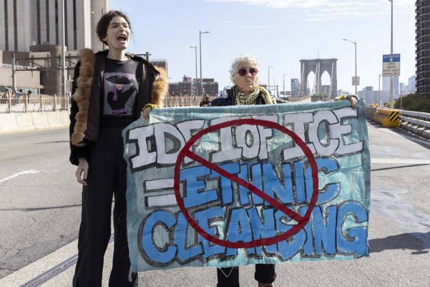 October 28, 2026, New York, New York, USA: Anti-ICE (U.S. Immigration and Customs Enforcement) demonstrators blockade the roadway on the Brooklyn Bridge with a banner that reads red circle slash IDF IOF ICE equals ETHNIC CLEANSING protesting the continued detainment of O. Belgal, who was shot by federal agents in the Bronx with his 5-yr-old son in the car. The demonstration stopped Brooklyn bound traffic and results in arrests by NYPD. Protesters call for ICE out of New York. New York USA - ZUMAr174 20261028_znp_r174_005 Copyright: xGinaxMxRandazzox