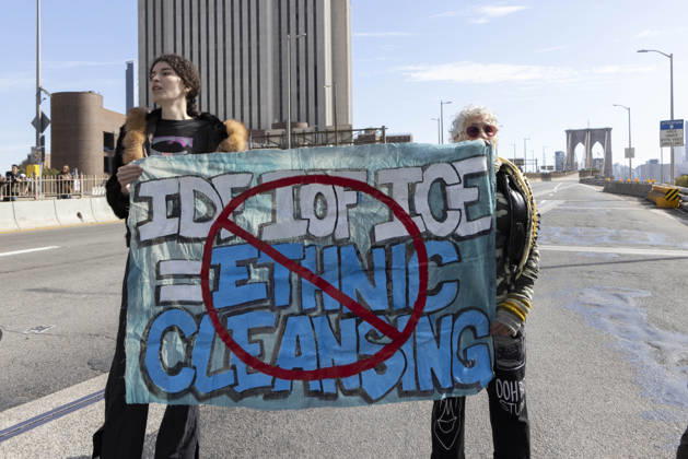 October 28, 2026, New York, New York, USA: Anti-ICE (U.S. Immigration and Customs Enforcement) demonstrators blockade the roadway on the Brooklyn Bridge with a banner that reads red circle slash IDF IOF ICE equals ETHNIC CLEANSING protesting the continued detainment of O. Belgal, who was shot by federal agents in the Bronx with his 5-yr-old son in the car. The demonstration stopped Brooklyn bound traffic and results in arrests by NYPD. Protesters call for ICE out of New York. New York USA - ZUMAr174 20261028_znp_r174_010 Copyright: xGinaxMxRandazzox