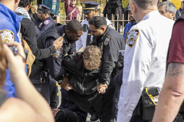 October 28, 2026, New York, New York, USA: Anti-ICE (U.S. Immigration and Customs Enforcement) demonstrators are arrested by NYPD after blockading the roadway and stopping traffic on the Brooklyn Bridge protesting the continued detainment of O. Belgal, who was shot by federal agents in the Bronx with his 5-yr-old son in the car. Protesters call for ICE out of New York. New York USA - ZUMAr174 20261028_znp_r174_019 Copyright: xGinaxMxRandazzox