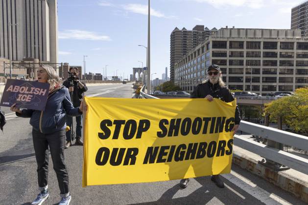 October 28, 2026, New York, New York, USA: Anti-ICE (U.S. Immigration and Customs Enforcement) demonstrators blockade the roadway on the Brooklyn Bridge with signs and banners that read STOP SHOOTING OUR NEIGHBORS ABOLISH ICE protesting the continued detainment of O. Belgal, who was shot by federal agents in the Bronx with his 5-yr-old son in the car. The demonstration stopped Brooklyn bound traffic and results in arrests by NYPD. Protesters call for ICE out of New York. New York USA - ZUMAr174 20261028_znp_r174_018 Copyright: xGinaxMxRandazzox