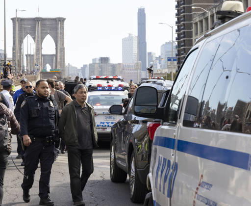 October 28, 2026, New York, New York, USA: Anti-ICE (U.S. Immigration and Customs Enforcement) demonstrators are arrested by NYPD after blockading the roadway and stopping traffic on the Brooklyn Bridge protesting the continued detainment of O. Belgal, who was shot by federal agents in the Bronx with his 5-yr-old son in the car. Protesters call for ICE out of New York. New York USA - ZUMAr174 20261028_znp_r174_024 Copyright: xGinaxMxRandazzox