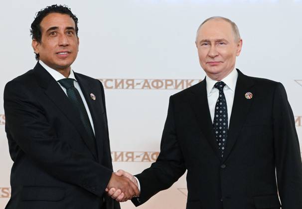 President Vladimir Putin officially greets heads of delegation at Russia-Africa Summit 9276247 28.10.2026 President Vladimir Putin during an official greeting ceremony for heads of delegation at the 3rd Russia-Africa Summit. Left: Chairman of the Presidential Council of Libya Mohamed al-Menfi. Alexandr Kryazhev Sputnik Crediting the source in the following order photographer s name Russia-Africa Summit and Economic and Humanitarian forum host ÑÄhoto agency is mandatory when using the photo Moscow Russia  Copyright: xAlexandrxKryazhevx