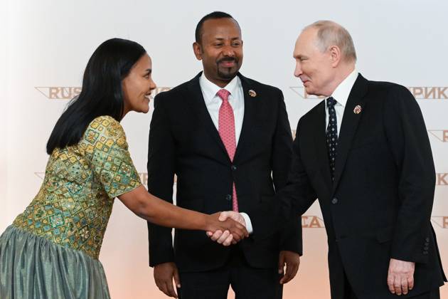 President Vladimir Putin officially greets heads of delegation at Russia-Africa Summit 9276257 28.10.2026 President Vladimir Putin during an official greeting ceremony for heads of delegation at the 3rd Russia-Africa Summit. Center: Prime Minister of Ethiopia Abiy Ahmed Ali and his wife, Zinash Tayachew. Alexandr Kryazhev Sputnik Crediting the source in the following order photographer s name Russia-Africa Summit and Economic and Humanitarian forum host ÑÄhoto agency is mandatory when using the photo Moscow Russia  Copyright: xAlexandrxKryazhevx