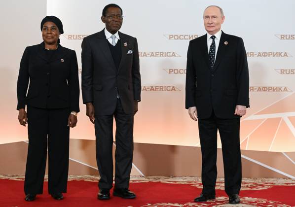 President Vladimir Putin officially greets heads of delegation at Russia-Africa Summit 9276265 28.10.2026 President Vladimir Putin during an official greeting ceremony for heads of delegation at the 3rd Russia-Africa Summit. Center: President of Equatorial Guinea Teodoro Obiang Nguema Mbasogo and his wife, Constancia Mangue Nsue Okomo. Alexandr Kryazhev Sputnik Crediting the source in the following order photographer s name Russia-Africa Summit and Economic and Humanitarian forum host ÑÄhoto agency is mandatory when using the photo Moscow Russia  Copyright: xAlexandrxKryazhevx