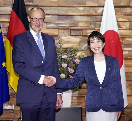 Japan-Germany leaders talks Japanese Prime Minister Sanae Takaichi (R) and German Chancellor Friedrich Merz shake hands ahead of their talks at the prime minister s office in Tokyo on Oct. 28, 2026.  A14AA0005632053P