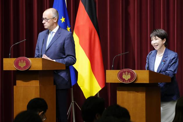 Japan-Germany leaders talks Japanese Prime Minister Sanae Takaichi (R) and German Chancellor Friedrich Merz hold a joint press conference after their talks at the prime minister s office in Tokyo on Oct. 28, 2026. The leaders agreed to strengthen critical mineral supply chains and to promote cooperation between their countries defense industries.  A14AA0005632055P