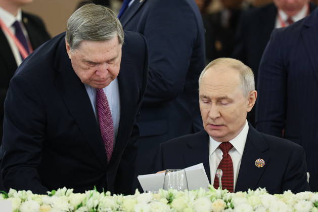 RUSSIA, MOSCOW - OCTOBER 29, 2026: Russia s President Vladimir Putin (R) and his Adviser Yuri Ushakov are pictured during the plenary session of the 2026 Russia-Africa Summit in the Kremlin Moscow Russia  - ZUMAt113 20261029_zaa_t113_297 Copyright: xSergeixSavostyanovx