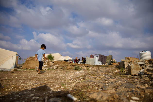 Flooding Damages Al-Talai Displacement Camp A child walks along a rock-strewn path toward tents and makeshift structures at Al-Tala i camp in Al-Hasakah, Syria, on October 29, 2026. Heavy rain on October 28-29 flooded tents at Al-Tala i, also known as Serekaniye camp, which shelters families displaced from Ras al-Ain, damaging bedding and belongings and prompting calls for humanitarian assistance. Al á¸¨asakah Al-Hasakah Syria Copyright: xMohammedxMirx