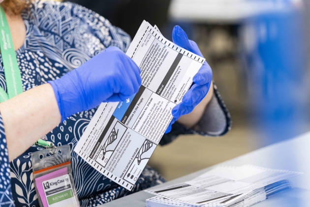 October 29, 2026, Renton, Washington, USA: Workers open mail-in ballots in a secure room for the 2026 mid-term election at the King County Elections office in Renton, Washington, USA, on Thu., Oct. 29, 2026. Approximately 98% of votes cast in Washington state are mail-in ballots. Renton USA - ZUMAb344 20261029_znp_b344_010 Copyright: xM.xScottxBrauerx