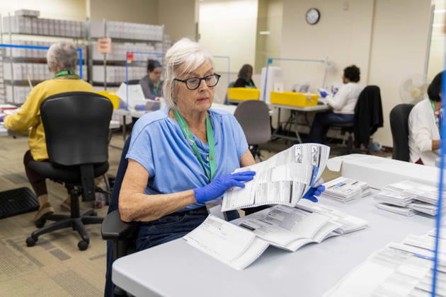 October 29, 2026, Renton, Washington, USA: Workers open mail-in ballots in a secure room for the 2026 mid-term election at the King County Elections office in Renton, Washington, USA, on Thu., Oct. 29, 2026. Approximately 98% of votes cast in Washington state are mail-in ballots. Renton USA - ZUMAb344 20261029_znp_b344_013 Copyright: xM.xScottxBrauerx