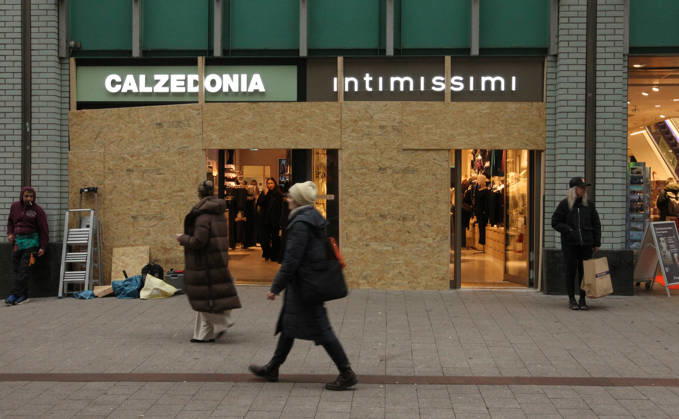 Calzedonia store on Spitalerstraße. The store s windows were barricaded with wooden panels out of fear of vandalism during Saturday s Gen Z demonstration in downtown Hamburg. Hamburg s Old Town