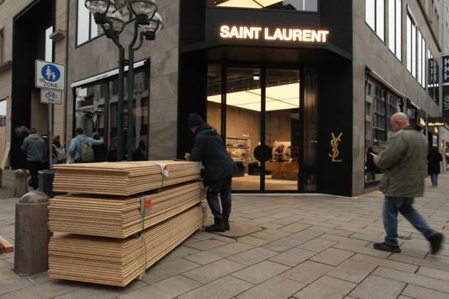 Saint Laurent store on Neuer Wall The store s windows were barricaded with wooden panels out of fear of vandalism during Saturday s Gen Z demonstration in downtown Hamburg. Hamburg s Old Town