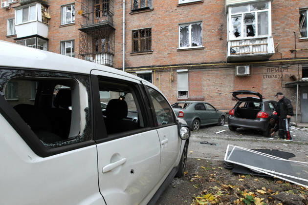 Cars are parked outside an apartment block on Oleksandra Polia Avenue damaged by a Russian drone strike in Dnipro, Ukraine, on October 30, 2026. The Russian attack damaged at least five residential high-rise buildings and a school. More than 300 windows were shattered in the strike. (Photo by Mykola Miakshykov Ukrinform) Russian attack damages residential buildings and school in Dnipro  Copyright: xMykolaxMiakshykovx