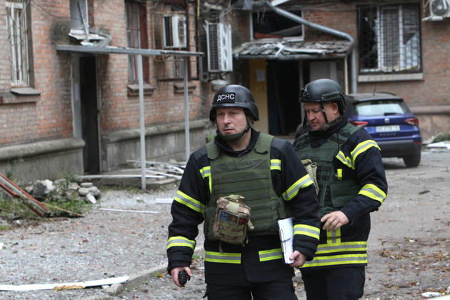 Rescuers work at an apartment block on Oleksandra Polia Avenue damaged by a Russian drone strike in Dnipro, Ukraine, on October 30, 2026. The Russian attack damaged at least five residential high-rise buildings and a school. More than 300 windows were shattered in the strike. (Photo by Mykola Miakshykov Ukrinform) Russian attack damages residential buildings and school in Dnipro  Copyright: xMykolaxMiakshykovx