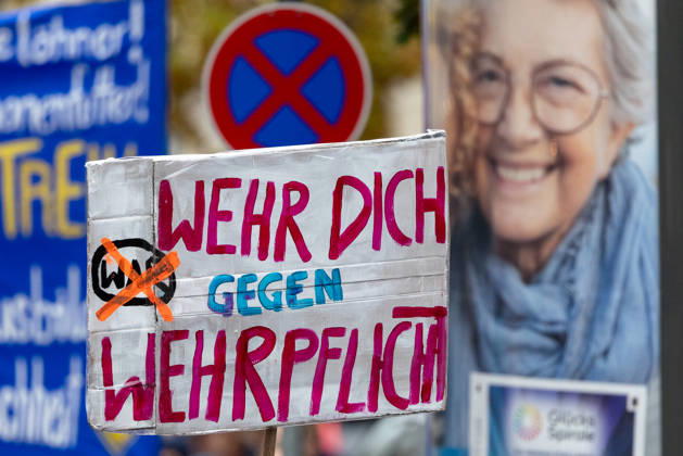 Gen Z Takes Charge: Hundreds March Through the Old Town and Südstadt, Nuremberg, October 31, 2026 A homemade sign reading Fight Against Conscription is held aloft during a rally organized by the Gen Z regelt initiative. The initiative is calling for more funding nationwide for education and health 20261031-1V9A3929-M4000