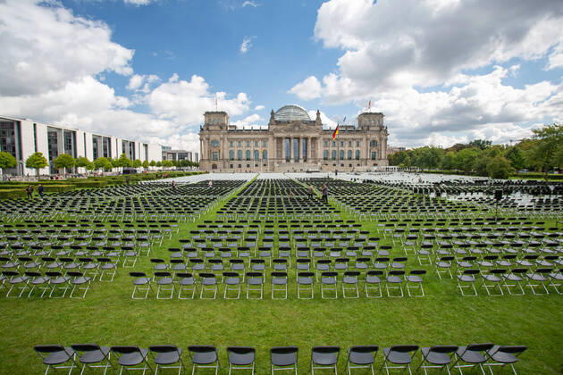Berlin, protest action with chairs in front of the Reichstag for the reception of refugees