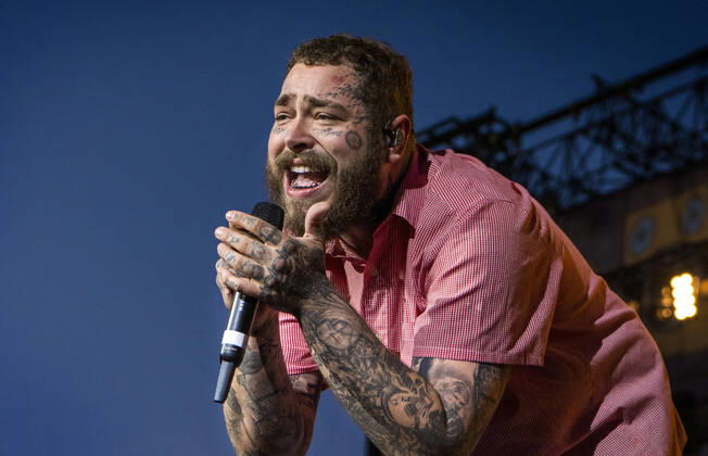 Post Malone falls into a hole at concert - archive pictures