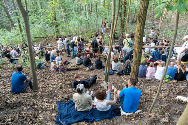 The Rolling Stones concert in Berlin, wild-listening fans in the forest
