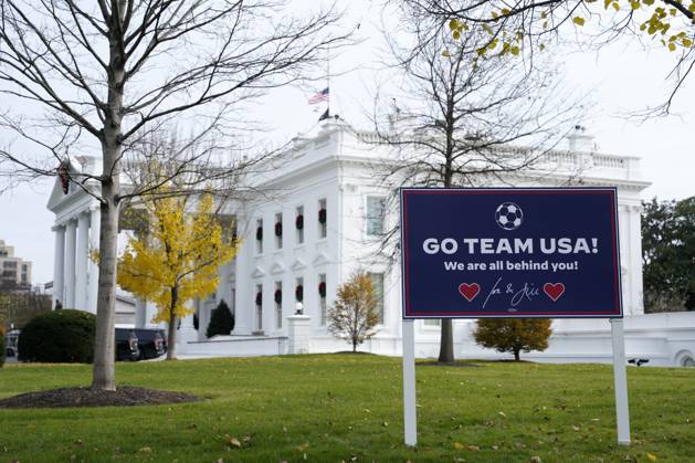 Washington, Go Team USA, sign in front of the White House for the World Cup football match against Iran